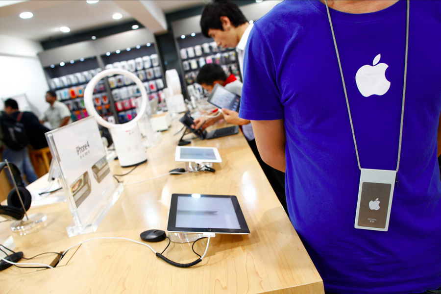 Apple сокращает производство iPhone